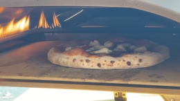 A cuantos grados se prepara la pizza