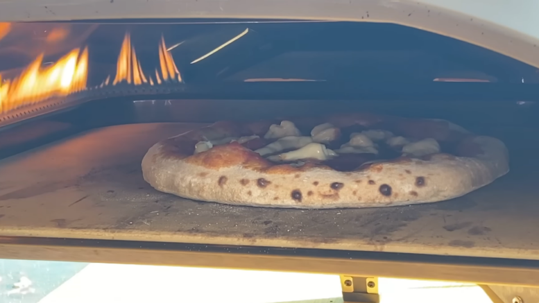 A cuantos grados se prepara la pizza